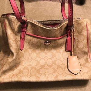 Coach purse in khaki and pink.